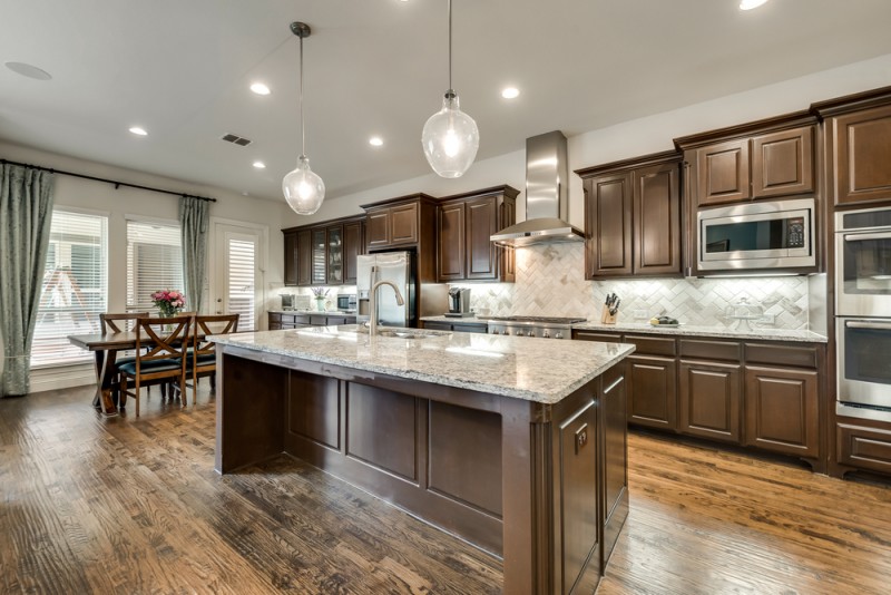    Chef s Kitchen with Granite Countertops and Large Island 