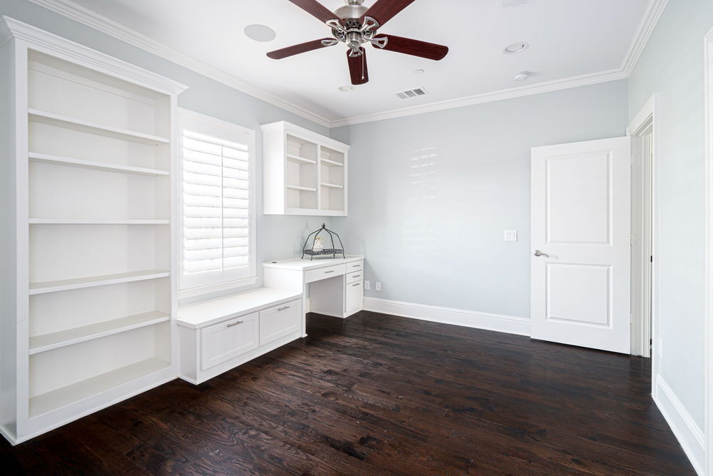 Secondary Bedroom with Built-In Desk Storage Closet and Ensuite Bathroom