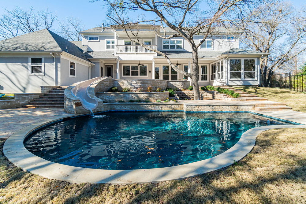 Sparkling Swimming Pool with Spa and Slide
