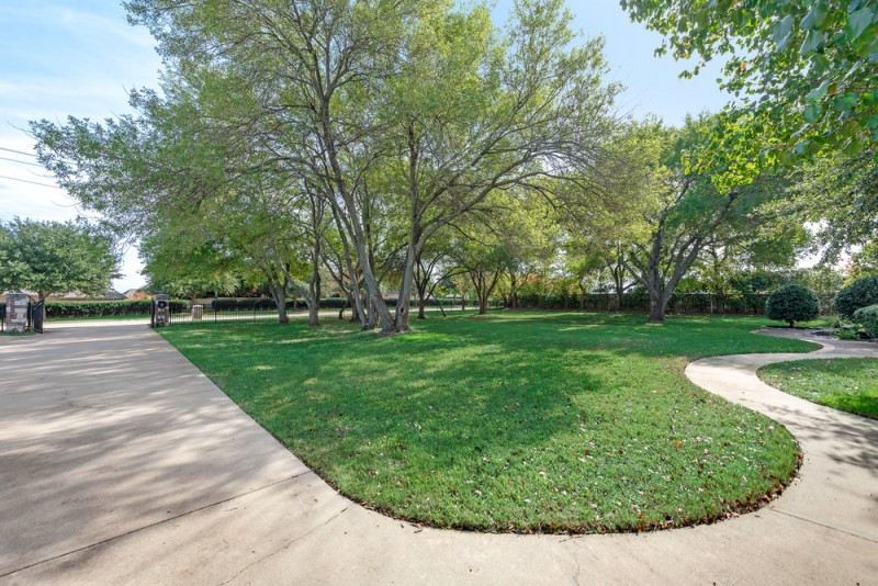    Sprawling Front Lawn with Mature Trees 