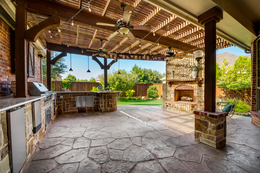    Serene Backyard with Chef s Dream Outdoor Kitchen and Fireplace 